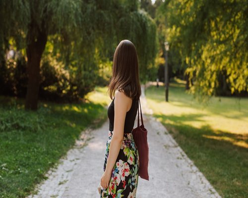 woman walking in nature park